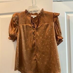 Gold blouse with puffy sleeves